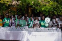 Final-year-students-from-beneficiary-schools-showcasing-the-solar-powered-lamps-at-the-launch-of-Green4Clean-project